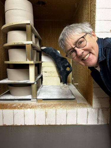 Mary in front of kiln