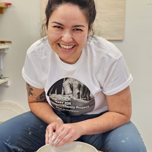 Sabrina throwing on the wheel