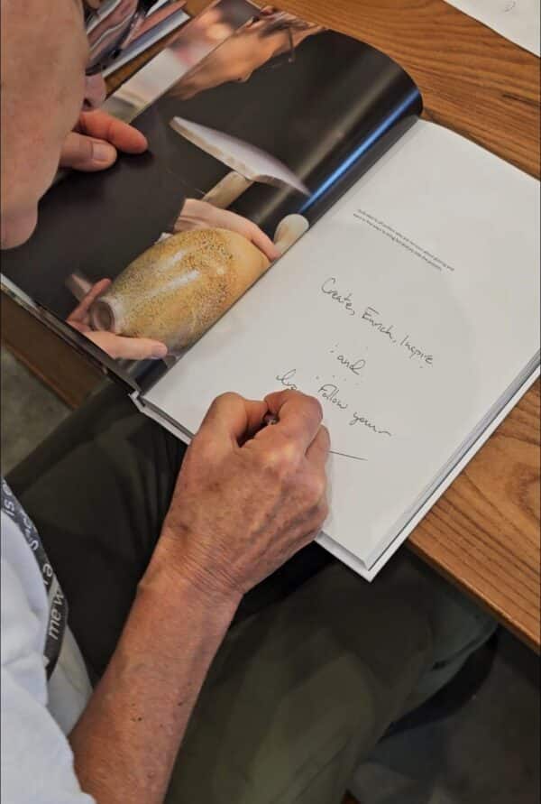 Mary signing