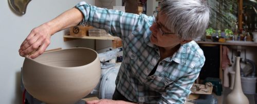 Mary Fox Pottery Header working on leatherhard chalice